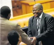  ?? /Sunday Times ?? New member: ANC members welcome Brian Molefe in the National Assembly after he was sworn in as an MP.