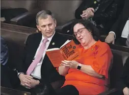  ?? Bill Clark CQ-Roll Call ?? REP. KATIE PORTER, with Rep. Sean Casten during the final vote for speaker on Saturday, announced her campaign Tuesday for U.S. Senate in 2024.
