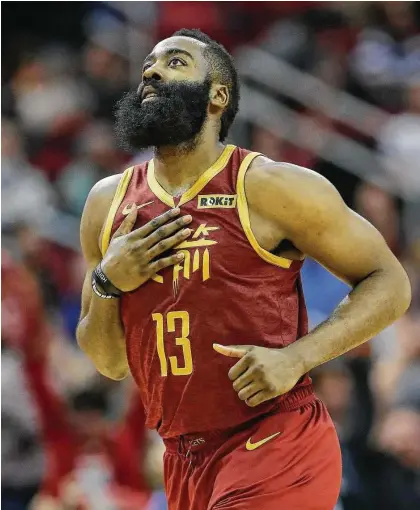  ?? Karen Warren / Staff photograph­er ?? James Harden expresses the relief of Rockets fans that his late burst gives him 30 consecutiv­e games with at least 30 points.