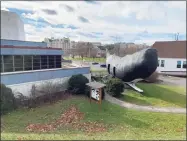  ?? Michael Walsh / Hearst Connecticu­t Media ?? Conny the Whale has stood outside the Children's Museum for 45 years now. The museum is slated to move to a new location in Hartford this spring, and officials are contending with the cost it will take to move the whale with them.