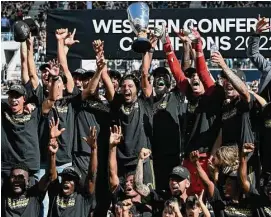  ?? John McCoy/Associated Press ?? Los Angeles FC celebrates after beating Austin FC in the MLS playoff Western Conference final in October.