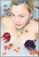  ??  ?? Madonna in a bath of rose petals