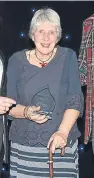  ??  ?? Jacky Low-Mitchell collected the Lifetime Achievemen­t award which she won with her late husband Dugald.