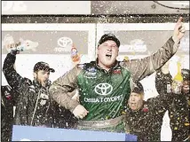  ??  ?? Austin Hill celebrates in Victory Lane after winning a NASCAR Truck Series auto race at Daytona Internatio­nal Speedway on Feb 15 in Daytona Beach, Florida. (AP)