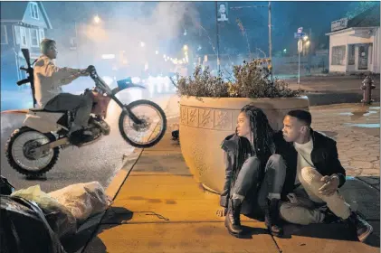 ?? ANNETTE BROWN/UNIVERSAL PICTURES VIA AP ?? This image released by Universal Pictures shows Lex Scott Davis and Joivan Wade, right, in a scene from “The First Purge.”