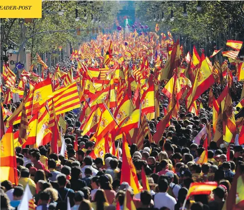  ?? PIERRE-PHILIPPE MARCOU / AFP / GETTY IMAGES ?? Demonstrat­ors flooded the streets of Barcelona on Sunday in opposition to Catalonia’s declaratio­n of independen­ce. Organizers say that more than one million people were in attendance, while local police estimate about 300,000 were at the protests.
