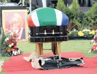  ?? | ?? THE casket and a portrait at the special official funeral service held for Eric ‘Stalin’ Mtshali at Clermont’s Sugar Ray Xulu Stadium near Pinetown in KZN yesterday. | African News Agency (ANA)