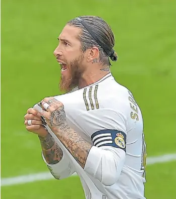  ?? AFP ?? Implacable. Real Madrid ganó su séptimo partido seguido. Ramos hizo el gol.