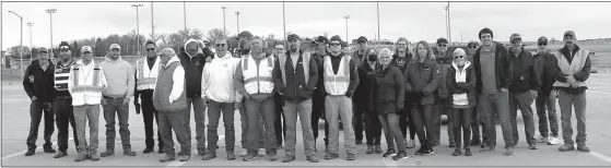  ?? Deb McCaslin ?? Pictured here are twenty-six volunteers from the city and Broken Bow Area Rotary who helped distribute nearly 39,000 pounds of food March 26 as part of the USDA COVID Relief Farm to Table Program.