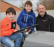  ??  ?? Declan, Oran and OJ Foley (Killorglin) pictured enjoying themselves at the James Ashe Memorial Vintage TractorRun.