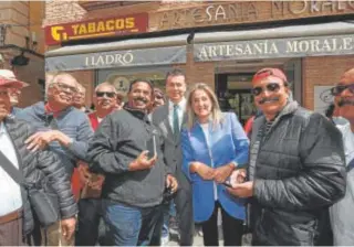  ?? // H. FRAILE ?? Milagros Tolón, con el ministro de Turismo, Héctor Gómez, en Toledo