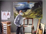  ?? Tyler Sizemore / Hearst CT Media ?? Artist Jeff Damberg with his painting “Before a Storm in the Rocky Mountains” in his Greenwich apartment.