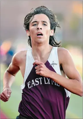  ?? TIM MARTIN/THE DAY ?? East Lyme’s Sam Whittaker nears the finish line to win Tuesday’s ECC quad-meet at Stonington. The Vikings defeated Ledyard, Stonington and Montville to finish 3-0 and Whittaker cruised to victory in a personal best 16:38.