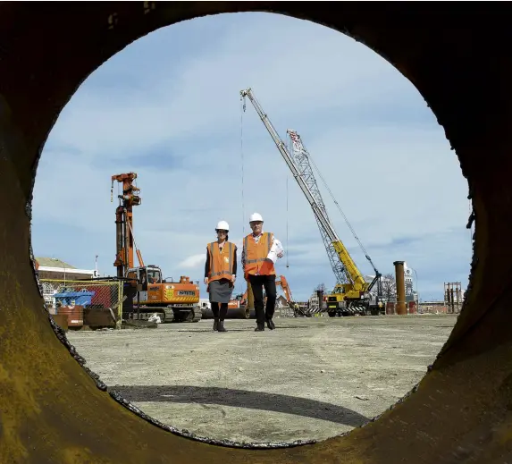  ?? PHOTO: GERARD O’BRIEN ?? Design in the round . . . Te Whatu Ora Health New Zealand Southern programme director Bridget Dickson and new Dunedin hospital principal architect Darryl Haines inspect the site of the future outpatient building.