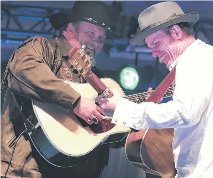  ?? SALTWIRE FILE ?? Pictou County singer-songwriter Dave Gunning, right, says he has been the victim of Facebook cloning. Gunning is shown performing with JP Cormier in 2016.