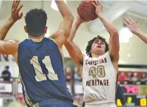  ?? STAFF FILE PHOTO ?? Christian Heritage senior Evan Lester (40) is trying to help his younger basketball teammates during his final season on the court before going on to play college football at Georgia Southern.