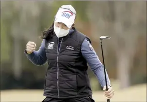  ?? AP photo ?? A Lim Kim reacts after making a birdie putt on the 18th hole to win the U.S. Women’s Open on Monday. It was Kim’s first appearance in the major.