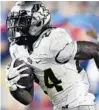  ?? JUSTIN BERL/GETTY ?? Junior Otis Anderson, top row, and sophomore Bentavious Thompson, bottom row, are expected to be leaned on to power the UCF running game Saturday against Temple with junior Greg McCrae sidelined.