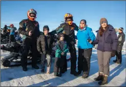  ??  ?? FAMILY TIME – Mike Morgan’s mother Ginny Emmons, sister Sandra Rowe, and her two children Jesse James and Bradley were there to greet Team 10 when it arrived in Nome.