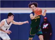  ?? Michael Wyke/Contributo­r ?? Woodlands Christian, led by guard Tres Luzey, right, will face Second Baptist for a third time.