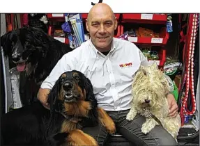  ??  ?? Pet pals: Dave Hume and dogs Toby, Elsie and Daisy