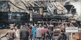  ?? PHOTOS BY NICK OTTO FOR THE WASHINGTON POST ?? Visitors check out one of the restored locomotive­s and cars at the California State Railroad Museum.