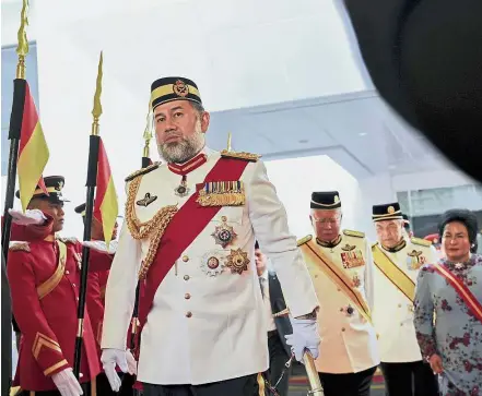  ?? — Bernama ?? Commander-in-Chief: Sultan Muhammad V arriving for the Trooping the Colour ceremony accompanie­d by Najib, Dr Ahmad Zahid and Rosmah