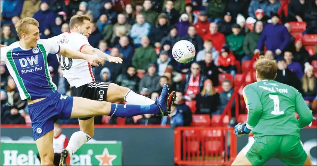  ?? PICTURE: PA Images ?? SO SHARP: The prolific Billy Sharp completes his hat-trick to wrap up the points