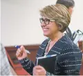  ??  ?? Former state Taxation and Revenue Secretary Demesia Padilla smiles as she walks out of court after a state district judge threw out five misdemeano­r counts against her Friday.