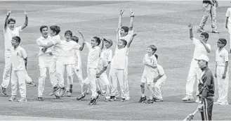  ?? Michael Ciaglo / Houston Chronicle ?? Students from local cricket academies cheer as former England and Yorkshire cricketer Michael Vaughan knocks a ball to the wall Tuesday at Minute Maid Park before teaching a clinic.