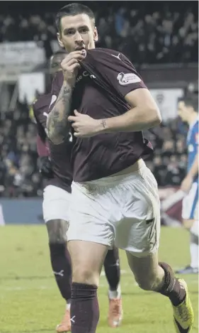  ??  ?? 0 Jamie Walker celebrates his first goal against Rangers last week.