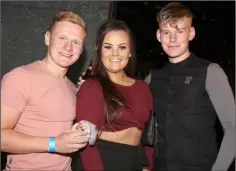  ??  ?? Dominik Morycki , Ciara Byrne and Conor Byrne at the annual Bree Barndance in Byrne’s Grain Store, Bree.