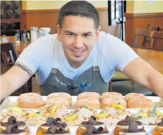  ?? MAX SANTIAGO/COURTESY ?? Pastry chef Max Santiago knows his way around a doughnut. He’ll be showing off Saturday during the seventh anniversar­y party at Temple Street Eatery in downtown Fort Lauderdale.