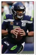  ?? AP/ELAINE THOMPSON ?? “No one in the NFL does more with fewer opportunit­ies than Wilson. No one,” Danny O’Neill of KIRO-FM in Seattle wrote about Seahawks quarterbac­k Russell Wilson.