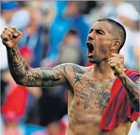  ??  ?? Captain fantastic: Aleksandar Kolarov celebrates Serbia’s victory over Costa Rica