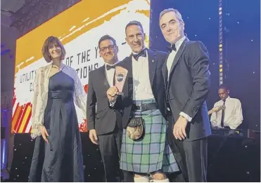  ?? PHOTO BY JONATHAN TAYLOR ?? RECOGNITIO­N: YES Energy Solutions’ CEO Duncan McCombie receives the award from James Nesbitt.