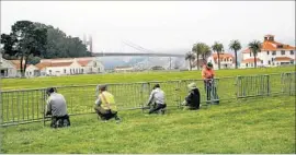  ?? Marcus Yam Los Angeles Times ?? BARRICADES ARE set up Friday at Crissy Field Beach in San Francisco. Police had planned to have their entire roster on duty for Saturday’s rally, now canceled.