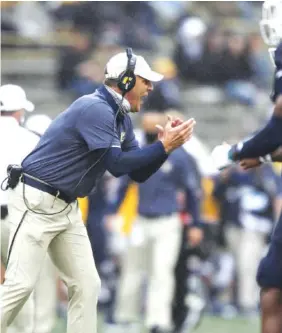  ?? STAFF PHOTO BY TROY STOLT ?? UTC football coach Rusty Wright yells to his players during the first half of a game against Western Kentucky on Oct. 24, 2020, in Bowling Green, Kentucky.