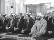  ??  ?? Syrian President Bashar al- Assad ( third from right in front row) prays at the start of Id ul- Fitr at the Anas bin Malik Mosque in Damascus on Thursday.