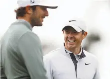  ?? Scott Strazzante / The Chronicle ?? Rory McIlroy (right), with Cal alum Max Homa, has four major titles, but none since the 2014 PGA Championsh­ip.