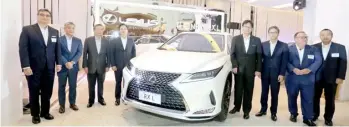  ??  ?? TOYOTA Motor Philippine­s executives launch the new RX.