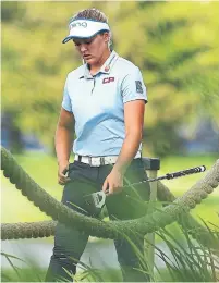  ?? GREGORY SHAMUS/GETTY IMAGES ?? Brooke Henderson walks to the 18th tee Saturday to finish her round, which included two bogeys, at the U.S. Women’s Open.