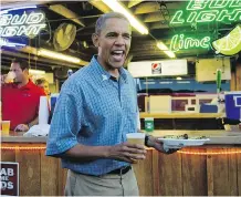  ?? JIM WATSON/ AFP/ GETTY IMAGES FILES ?? U. S. President Barack Obama visits the Iowa State Fair in August 2012. Most of the 2016 presidenti­al hopefuls are expected to pass through the state that starts the voting in the race for the White House.