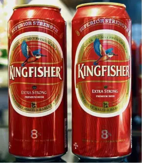  ??  ?? Spot the fake: Kingfisher’s Extra Strong Premium Beer. The original can is on the right.