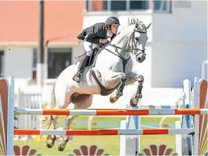  ?? SIMON O’CONNOR/ STUFF ?? Nicholas Beal, of Auckland, riding Sacramento at the showjumpin­g event in Ha¯wera on Sunday.