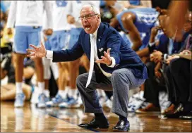  ?? BEN MCKEOWN/AP 2020 ?? Roy Williams makes an impassione­d plea during North Carolina’s game against Virginia Tech during this year’s ACC tournament.