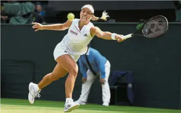  ?? — AP ?? Back to you: Angelique Kerber returning a shot to Jelena Ostapenko during the women’s singles semi-finals yesterday.