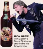  ??  ?? IRON BREW: Iron Maiden’s Bruce Dickinson and the band’s Trooper beer