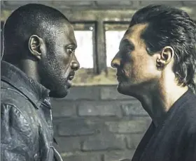  ?? Sony Pictures ?? Idris Elba, left, and Matthew McConaughe­y in “The Dark Tower.”