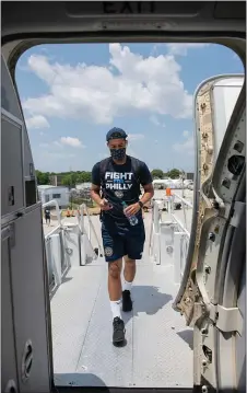  ?? SUBMITTED PHOTO - COURTESY OF PHILADELPH­IA UNION ?? Union forward Andrew Wooten boards a charter flight in Philadelph­ia bound for Orlando and the MLS Is Back tournament, which starts this week.